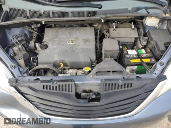 2013 Toyota Sienna LE with VIN 5TDJK3DC7DS056783, listed as a Copart auction lot 70763105 with 115,117 mi miles and Clean title. Bid and sale history available at DreamBid. Image 12.