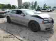 2014 Chrysler 300 S with VIN 2C3CCABT1EH119989, listed as a Copart auction lot 59122485 with 148,236 mi miles and Clean title. Bid and sale history available at DreamBid. Image 4.