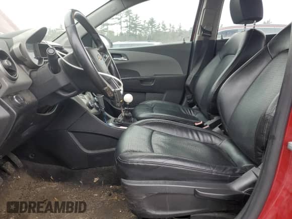 2012 Chevrolet Sonic LTZ с VIN 1G1JF6SH7C4151724, выставлен на аукционе Copart как лот 82821394 с пробегом 148 895 миль миль и Списание • Salvage title. История ставок и продаж доступна на DreamBid. Изображение 7.