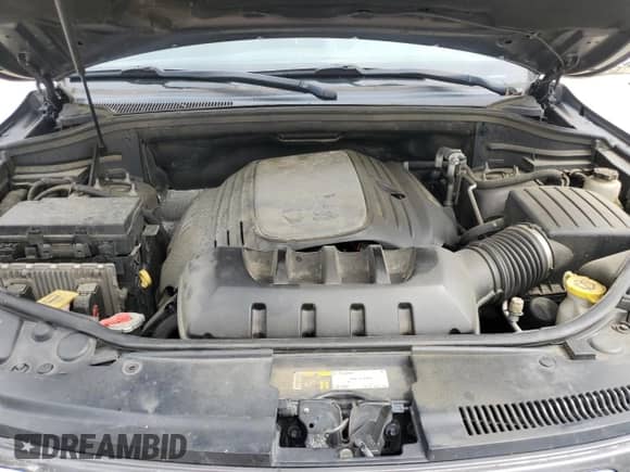 2015 Jeep Grand Cherokee Overland с VIN 1C4RJECT7FC629477, выставлен на аукционе Copart как лот 55810215 с пробегом 154 990 миль миль и Списание • Salvage title. История ставок и продаж доступна на DreamBid. Изображение 11.