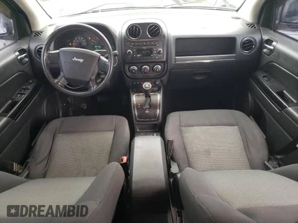 2010 Jeep Compass Latitude с VIN 1J4NF1FB1AD646011, выставлен на аукционе Copart как лот 79056184 с пробегом 178 737 миль миль и На запчасти • Non repairable. История ставок и продаж доступна на DreamBid. Изображение 8.