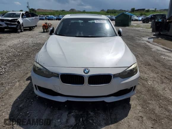 2013 BMW 3 Series 328i с VIN WBA3A5G52DNP22021, выставлен на аукционе Copart как лот 84760435 с пробегом 228 225 миль миль и Списание • Salvage title. История ставок и продаж доступна на DreamBid. Изображение 5.
