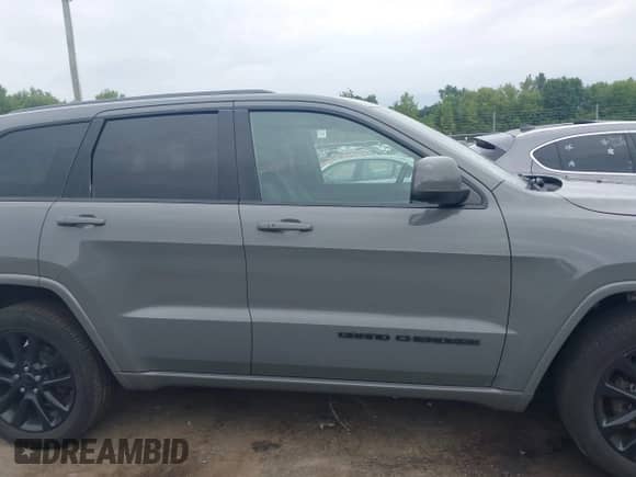 2020 Jeep Grand Cherokee Laredo E with VIN 1C4RJFAG6LC176718, listed as a IAAI auction lot 43043174 with 128,424 mi miles and . Bid and sale history available at DreamBid. Image 13.