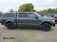 2019 Ford F-150 XLT z VIN 1FTEW1E43KFA09765, wystawiony jako IAAI lot #43442175 z przebiegiem 96 007 mil mil oraz . Historia ofert i sprzedaży dostępna na DreamBid. Obrazek 13.