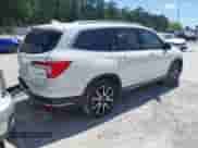 2021 Honda Pilot Touring 8-Passenger z VIN 5FNYF5H98MB037807, wystawiony jako IAAI lot #42136047 z przebiegiem 80 990 mil mil oraz . Historia ofert i sprzedaży dostępna na DreamBid. Obrazek 4.