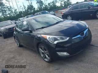 2015 Hyundai Veloster with VIN KMHTC6AD9FU235289, listed as a IAAI auction lot 42244334 with 117,082 mi miles and . Bid and sale history available at DreamBid. Image 1.