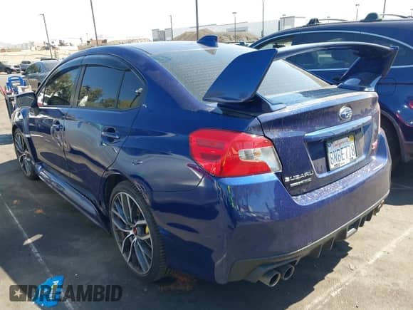 2020 Subaru WRX STI with VIN JF1VA2E61L9802526, listed as a IAAI auction lot 43306395 with 79,114 mi miles and . Bid and sale history available at DreamBid. Image 3.