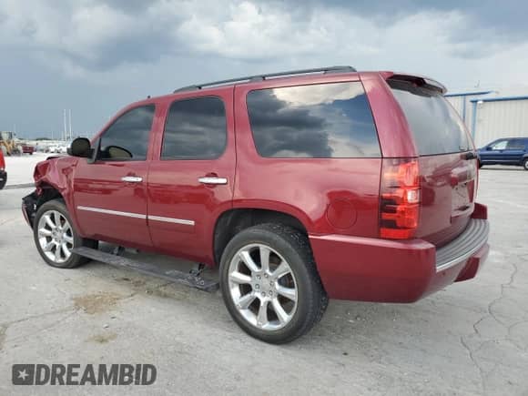 2011 Chevrolet Tahoe LTZ with VIN 1GNSKCE00BR315500, listed as a Copart auction lot 65207035 with 137,422 mi miles and Salvage title. Bid and sale history available at DreamBid. Image 2.