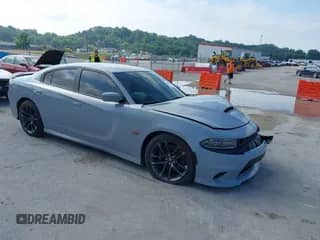 2021 Dodge Charger Scat Pack Widebody z VIN 2C3CDXGJXMH659217, wystawiony jako IAAI lot #42666802 z przebiegiem 43 369 mil mil oraz . Historia ofert i sprzedaży dostępna na DreamBid. Obrazek 1.