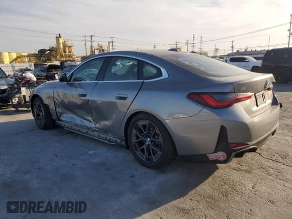 2024 BMW i4 eDrive35 with VIN WBY43AW06RFS38949, listed as a Copart auction lot 46886215 with 11,924 mi miles and Salvage title. Bid and sale history available at DreamBid. Image 2.