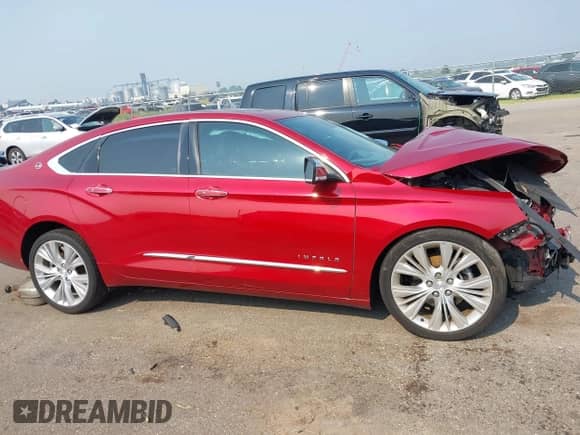 2014 Chevrolet Impala LTZ with VIN 2G1155S37E9102752, listed as a IAAI auction lot 42893804 with 139,693 mi miles and . Bid and sale history available at DreamBid. Image 13.