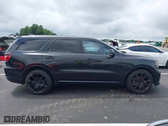 2014 Dodge Durango R/T with VIN 1C4SDHCT2EC313395, listed as a IAAI auction lot 42958438 with 113,110 mi miles and . Bid and sale history available at DreamBid. Image 13.