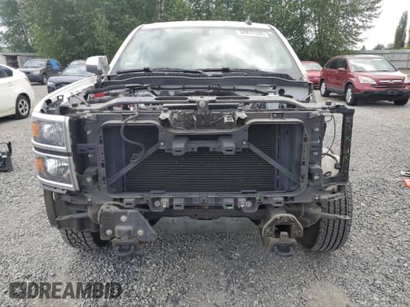 2015 Chevrolet Silverado 1500 LT with VIN 1GCUKREC6FF197796, listed as a Copart auction lot 58971125 with 115,248 mi miles and Salvage title. Bid and sale history available at DreamBid. Image 5.