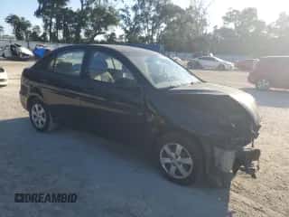 2009 Hyundai Accent Auto GLS z VIN KMHCN46C69U287255, wystawiony jako Copart lot #82108655 z przebiegiem 195 612 mil mil oraz Nie do naprawy • Non repairable. Historia ofert i sprzedaży dostępna na DreamBid. Obrazek 4.