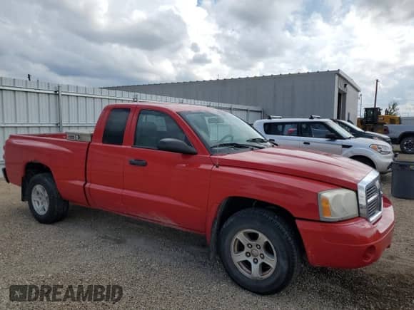 2007 Dodge Dakota SLT with VIN 1D7HE42K97S195093, listed as a Copart auction lot 81133015 with 132,799 mi miles and Salvage title. Bid and sale history available at DreamBid. Image 4.