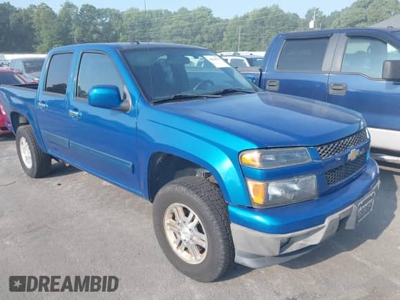 2011 Chevrolet Colorado 1LT z VIN 1GCHTCFE8B8133074, wystawiony jako IAAI lot #43024551 z przebiegiem 203 594 mil mil oraz . Historia ofert i sprzedaży dostępna na DreamBid. Obrazek 1.