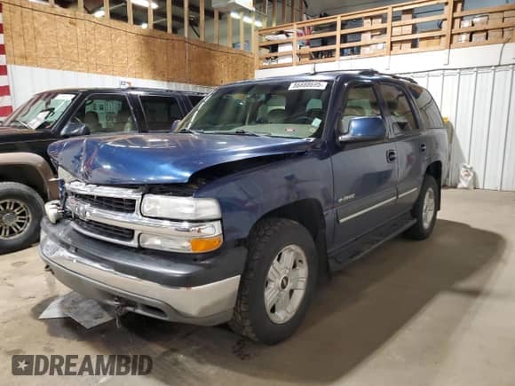 2003 Chevrolet Tahoe LT z VIN 1GNEK13Z33J204958, wystawiony jako Copart lot #86888695 z przebiegiem 136 986 mil mil oraz Szkoda całkowita • Salvage title. Historia ofert i sprzedaży dostępna na DreamBid. Obrazek 1.
