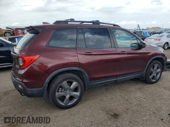 2019 Honda Passport Touring z VIN 5FNYF8H97KB016820, wystawiony jako Copart lot #61562855 z przebiegiem 41 772 mil mil oraz Szkoda całkowita • Salvage title. Historia ofert i sprzedaży dostępna na DreamBid. Obrazek 3.