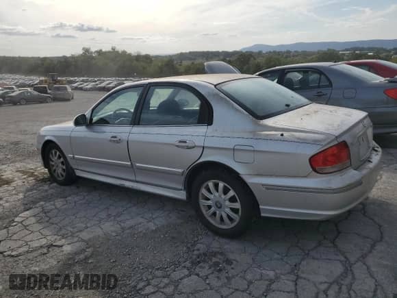 2003 Hyundai Sonata GLS with VIN KMHWF35H63A910917, listed as a Copart auction lot 71657584 with 120,196 mi miles and Salvage title. Bid and sale history available at DreamBid. Image 2.