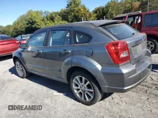 2011 Dodge Caliber Heat with VIN 1B3CB5HA7BD231380, listed as a Copart auction lot 82520765 with 217,144 mi miles and Clean title. Bid and sale history available at DreamBid. Image 2.
