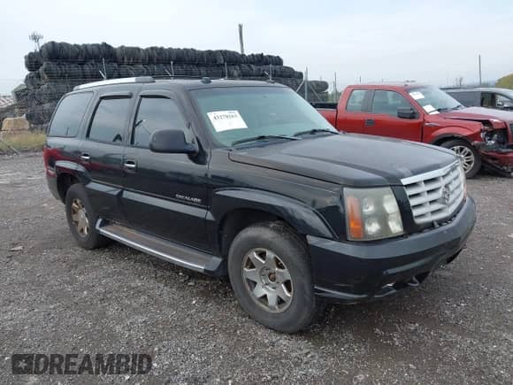 2004 Cadillac Escalade z VIN 1GYEK63N84R287562, wystawiony jako IAAI lot #43278263 z przebiegiem 201 573 mil mil oraz . Historia ofert i sprzedaży dostępna na DreamBid. Obrazek 1.