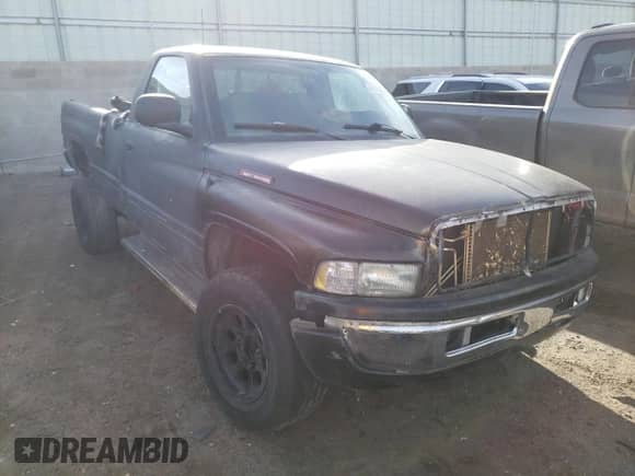 2002 Dodge 2500 with VIN 3B7KF26Z52M237348, listed as a Copart auction lot 76487874 with Not provided miles and Salvage title. Bid and sale history available at DreamBid. Image 4.