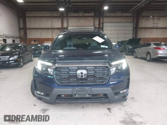 2022 Honda Passport EX-L z VIN 5FNYF8H51NB004387, wystawiony jako IAAI lot #42293741 z przebiegiem 41 689 mil mil oraz . Historia ofert i sprzedaży dostępna na DreamBid. Obrazek 13.