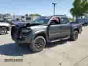 2021 Toyota Tacoma Limited with VIN 3TMGZ5AN0MM420386, listed as a Copart auction lot 52346285 with 49,912 mi miles and Salvage title. Bid and sale history available at DreamBid. Image 1.