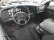 2002 Dodge 1500 z VIN 1D7HA16K52J214340, wystawiony jako Copart lot #61158705 z przebiegiem 279 568 mil mil oraz Szkoda całkowita • Salvage title. Historia ofert i sprzedaży dostępna na DreamBid. Obrazek 8.