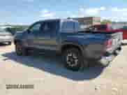 2021 Toyota Tacoma TRD Off Road с VIN 3TMCZ5AN4MM445659, выставлен на аукционе Copart как лот 70141145 с пробегом 104 371 миль миль и Списание • Salvage title. История ставок и продаж доступна на DreamBid. Изображение 2.