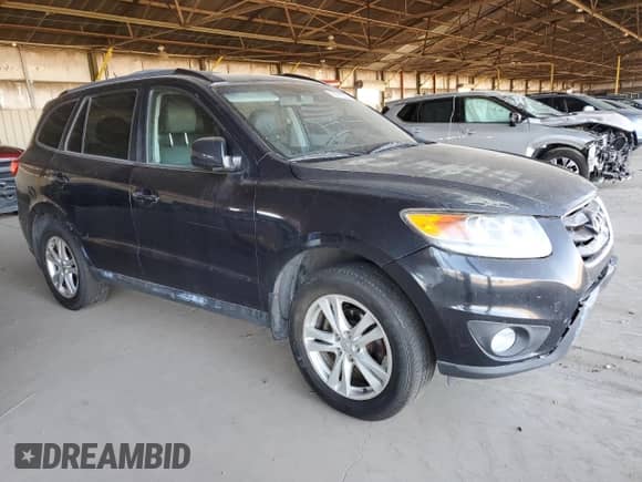 2012 Hyundai Santa Fe SE с VIN 5XYZH4AG2CG108430, выставлен на аукционе Copart как лот 66918005 с пробегом 188 179 миль миль и Списание • Salvage title. История ставок и продаж доступна на DreamBid. Изображение 4.