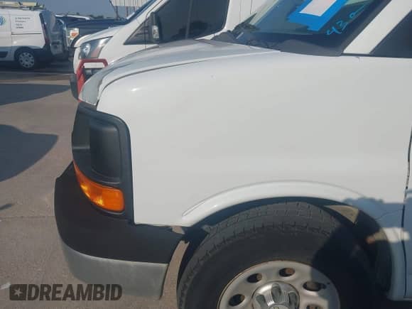 2012 Chevrolet Express Cargo z VIN 1GCSGAFXXC1129988, wystawiony jako IAAI lot #43169101 z przebiegiem 218 792 mil mil oraz . Historia ofert i sprzedaży dostępna na DreamBid. Obrazek 6.