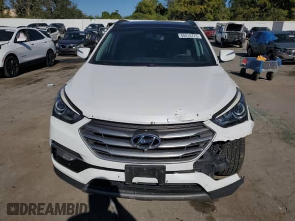 2017 Hyundai Santa Fe Ultimate с VIN 5XYZWDLAXHG447314, выставлен на аукционе Copart как лот 85910775 с пробегом 121 017 миль миль и Списание • Salvage title. История ставок и продаж доступна на DreamBid. Изображение 5.