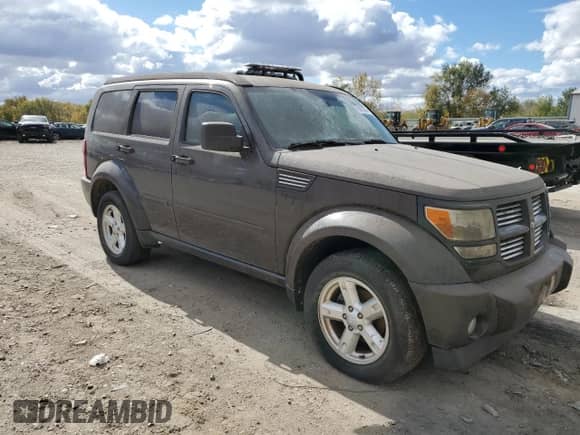 2011 Dodge Nitro SXT с VIN 1D4PT5GK0BW564938, выставлен на аукционе Copart как лот 76313854 с пробегом Не указан миль и Чистый • Clean title. История ставок и продаж доступна на DreamBid. Изображение 4.