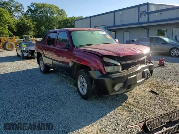 2004 Chevrolet Avalanche with VIN 3GNEK12T24G144252, listed as a Copart auction lot 70732535 with 142,122 mi miles and Salvage title. Bid and sale history available at DreamBid. Image 14.