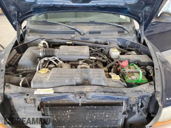 2003 Dodge Dakota SLT z VIN 1D7HG42N13S111122, wystawiony jako Copart lot #65447505 z przebiegiem 89 870 mil mil oraz Szkoda całkowita • Salvage title. Historia ofert i sprzedaży dostępna na DreamBid. Obrazek 11.