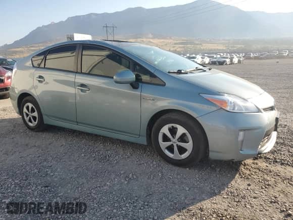 2015 Toyota Prius Two with VIN JTDKN3DU8F1909762, listed as a Copart auction lot 69941255 with 178,147 mi miles and Salvage title. Bid and sale history available at DreamBid. Image 4.