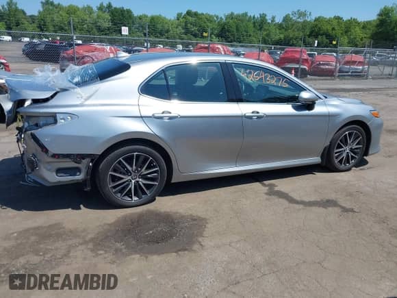 2023 Toyota Camry Hybrid XLE с VIN 4T1F31AK7PU620561, выставлен на аукционе IAAI как лот 42543275 с пробегом 21 431 миль миль и . История ставок и продаж доступна на DreamBid. Изображение 14.