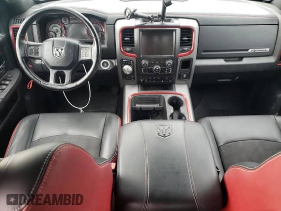 2016 Ram 1500 Rebel z VIN 1C6RR7YT4GS229923, wystawiony jako Copart lot #80774565 z przebiegiem 128 682 mil mil oraz Szkoda całkowita • Salvage title. Historia ofert i sprzedaży dostępna na DreamBid. Obrazek 8.