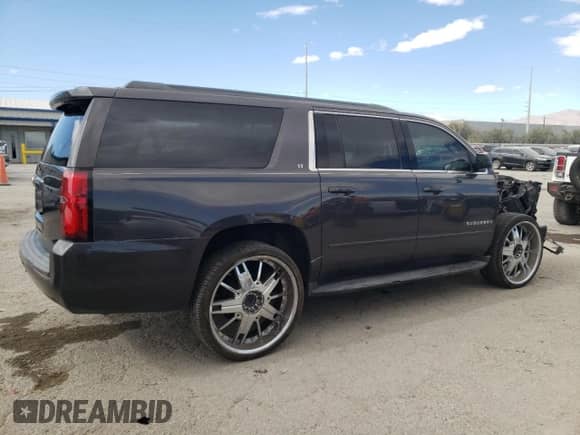 2017 Chevrolet Suburban LT с VIN 1GNSCHKC0HR117209, выставлен на аукционе Copart как лот 77014054 с пробегом 62 297 миль миль и Списание • Salvage title. История ставок и продаж доступна на DreamBid. Изображение 3.