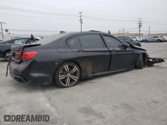 2019 BMW 7 Series 750i with VIN WBA7F0C51KGM25691, listed as a Copart auction lot 60250925 with Not provided miles and Salvage title. Bid and sale history available at DreamBid. Image 3.