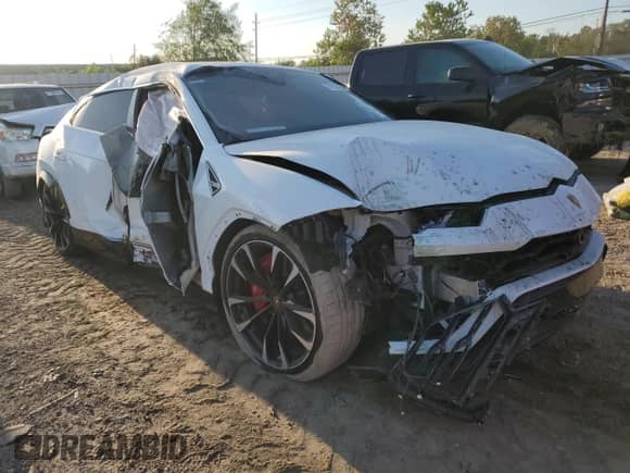 2022 Lamborghini Urus with VIN ZPBUA1ZL8NLA22604, listed as a Copart auction lot 77174164 with Not provided miles and Salvage title. Bid and sale history available at DreamBid. Image 4.