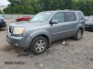 2009 Honda Pilot Touring with VIN 5FNYF48879B025317, listed as a Copart auction lot 62288685 with 290,816 mi miles and Salvage title. Bid and sale history available at DreamBid. Image 1.