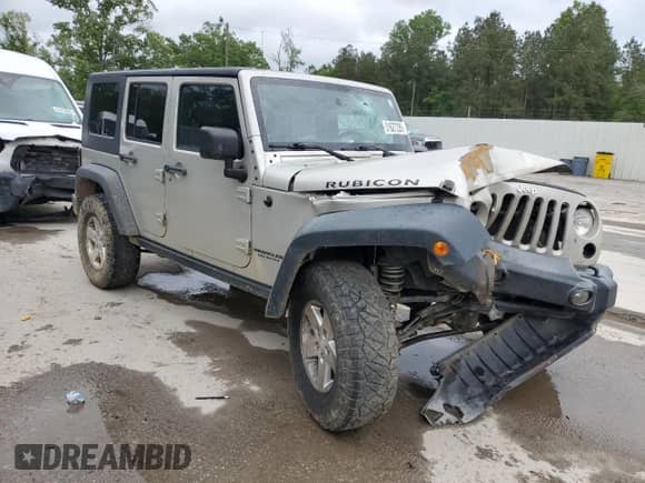 2007 Jeep Wrangler Unlimited Rubicon with VIN 1J4GA69167L190996, listed as a Copart auction lot 51627285 with Not provided miles and Salvage title. Bid and sale history available at DreamBid. Image 4.