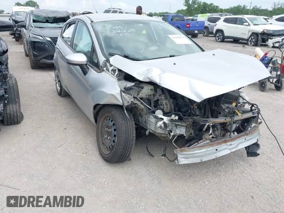 2014 Ford Fiesta S z VIN 3FADP4TJ9EM212897, wystawiony jako IAAI lot #42422212 z przebiegiem Nie podano mil oraz . Historia ofert i sprzedaży dostępna na DreamBid. Obrazek 6.
