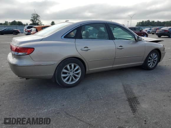 2008 Hyundai Azera Limited с VIN KMHFC46F48A265722, выставлен на аукционе Copart как лот 69729245 с пробегом 154 033 миль миль и Списание • Salvage title. История ставок и продаж доступна на DreamBid. Изображение 3.