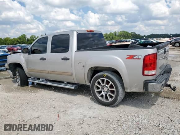 2007 GMC Sierra 1500 SLE2 with VIN 2GTEC13J871520873, listed as a Copart auction lot 71089175 with 130,379 mi miles and Salvage title. Bid and sale history available at DreamBid. Image 2.
