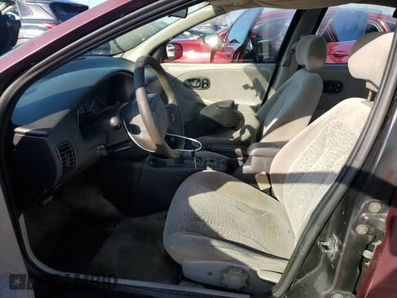 2001 Saturn SL with VIN 1G8ZK52711Z324512, listed as a Copart auction lot 73812924 with 121,284 mi miles and Salvage title. Bid and sale history available at DreamBid. Image 7.