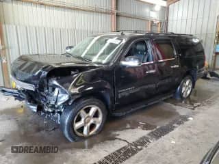 2009 Chevrolet Suburban 2LT с VIN 1GNFK26389R297813, выставлен на аукционе Copart как лот 68130925 с пробегом Не указан миль и Списание • Salvage title. История ставок и продаж доступна на DreamBid. Изображение 1.