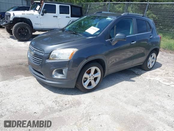 2016 Chevrolet Trax LTZ z VIN 3GNCJMSB1GL179671, wystawiony jako IAAI lot #42715210 z przebiegiem Nie podano mil oraz . Historia ofert i sprzedaży dostępna na DreamBid. Obrazek 16.